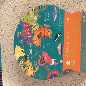 Super fun around the worlds kid puzzle. has all 50 pieces.